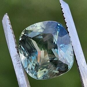 GIA Certified 7.07ct. Color Change Bluish-Green Natural Sapphire- Heated Only.